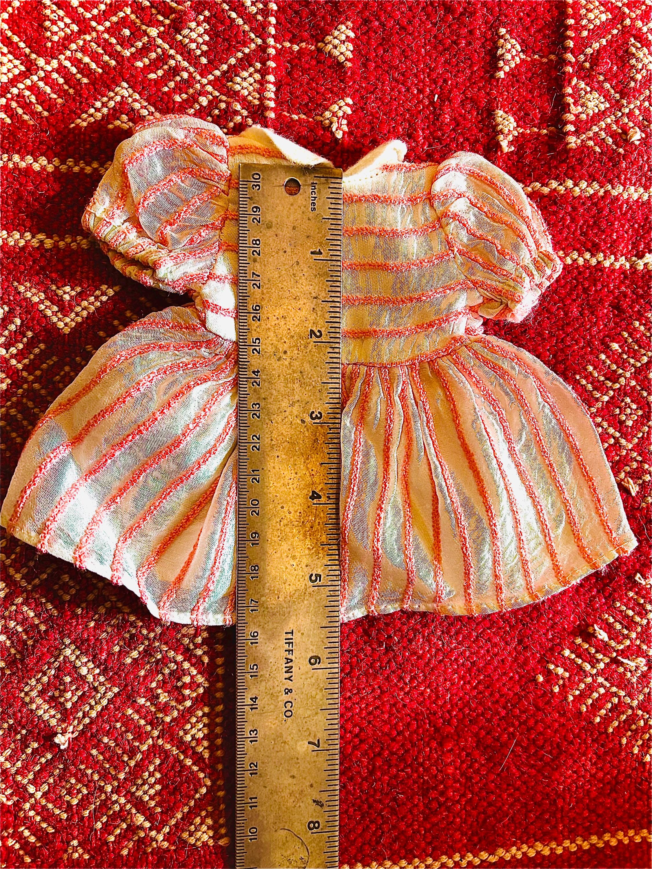 Ensemble tricoté pour poupée - France