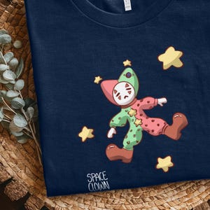 Vintage Space Clown T-Shirt, Retro Cosmic Clowncore Tee, Minimal Outer Space Aesthetic Shirt, Celestial Circus Design, Funny Quirky Gift
