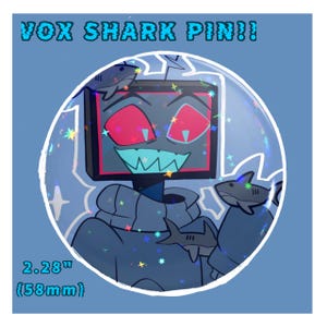 May include: A round pin featuring a cartoon character with a screen-shaped head, red eyes, and a teal mouth. The pin includes the text "VOX SHARK PIN!!" and measures 58mm in diameter. Sharks and stars are also featured in the design.