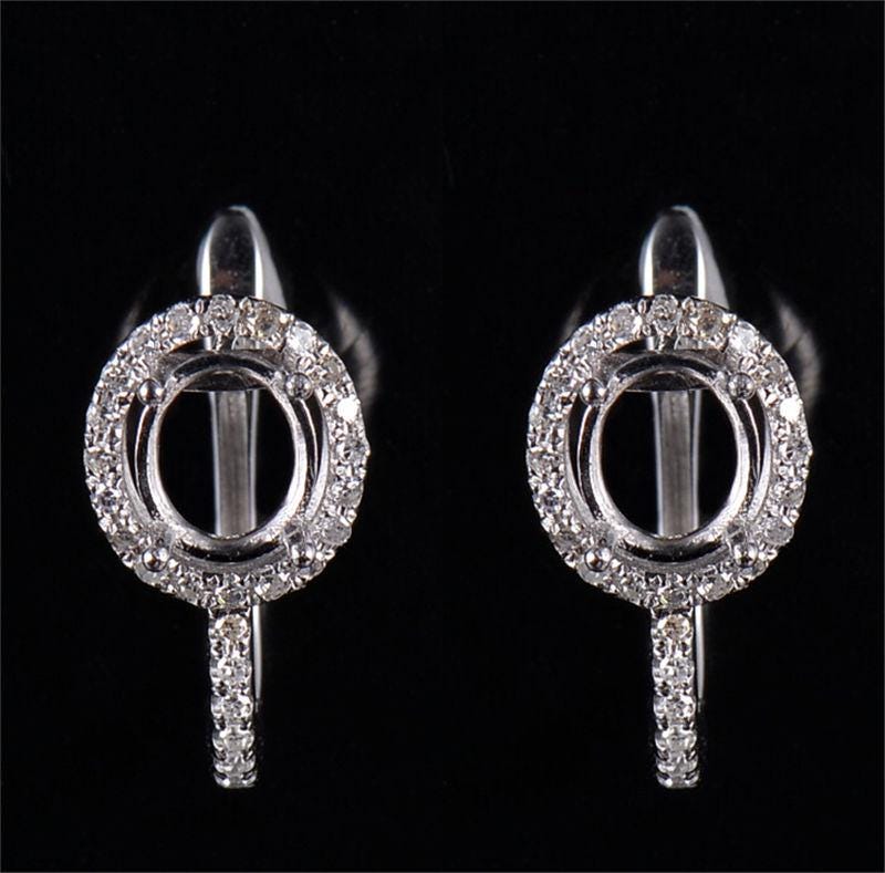 This Fine French Clip Earrings Semi Mount can fit 7x5mm oval cut center stone, accented with small Moissanite diamonds.
