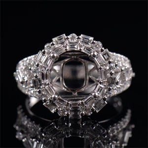 This Luxury Art Deco Ring Semi Mount can fit a 8mm round cut center stone, accented with Small Moissanite Diamonds.