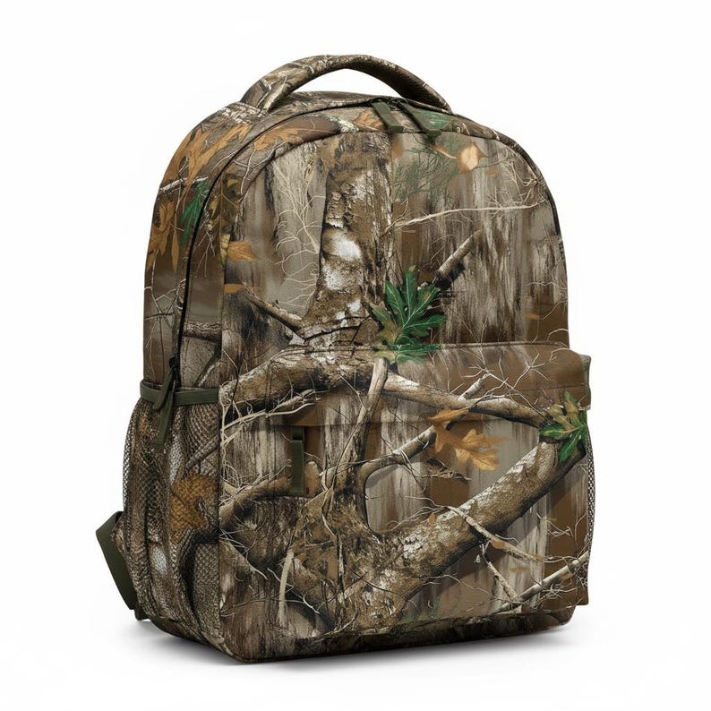 May include: A camouflage backpack with a top handle and mesh side pocket. The backpack features a realistic forest pattern in shades of brown, green, and tan, designed to blend with natural environments. The bag is designed for outdoor activities.