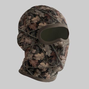 Puede incluir: Pasamonta&ntilde;as de camuflaje con un patr&oacute;n de hojas de roble marrones y beige. La abertura para los ojos es grande y est&aacute; delineada en marr&oacute;n. El pasamonta&ntilde;as est&aacute; dise&ntilde;ado para cubrir la cabeza y el cuello.