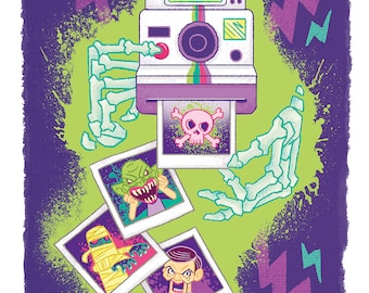 May include: A vintage-style instant camera with a purple and white design, surrounded by green and purple splatter paint. The camera is holding four instant photos, each featuring a different monster: a green monster with a toothy grin, a mummy, a ventriloquist dummy, and a skull with crossbones.