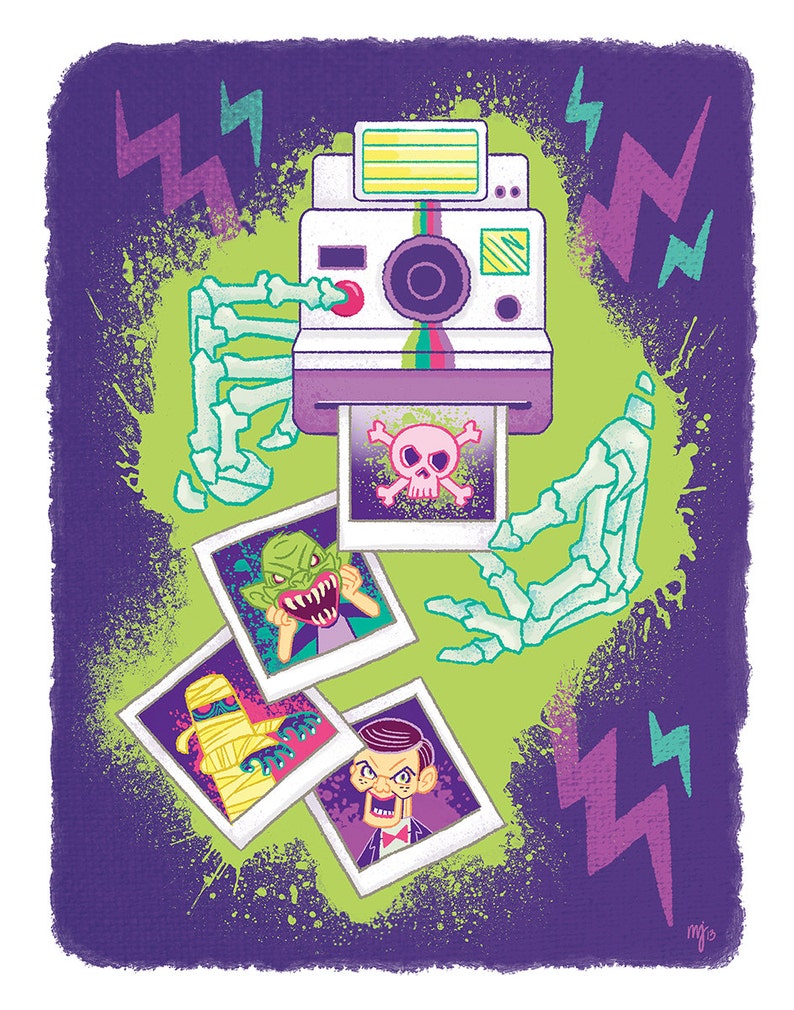 May include: A vintage-style instant camera with a purple and white design, surrounded by green and purple splatter paint. The camera is holding four instant photos, each featuring a different monster: a green monster with a toothy grin, a mummy, a ventriloquist dummy, and a skull with crossbones.
