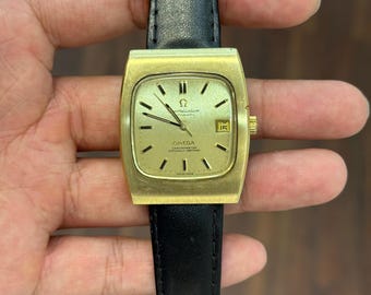 Reloj Omega Constellation automático para hombre, de acero y oro, con fecha y cronómetro vintage.