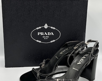 Elegant Prada heeled sandals crafted from smooth black leather size Eu 40