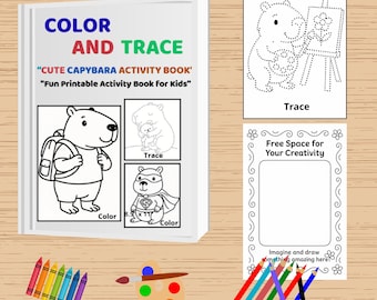 May include: A white activity book titled "COLOR AND TRACE" with the text "CUTE CAPYBARA ACTIVITY BOOK" and "Fun Printable Activity Book For Kids". The book includes coloring and tracing pages, along with crayons, a paintbrush, and a paint palette.