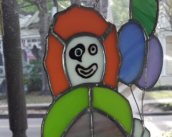 A Clown Suncatcher In Stained Glass