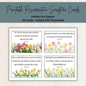 May include: A set of four rectangular cards featuring watercolour floral illustrations of tulips and daffodils at the bottom. Each card contains black printed scripture text including Job 19:25, John 15:13, Mark 10:45, and Romans 5:8. The cards are arranged in a grid.
