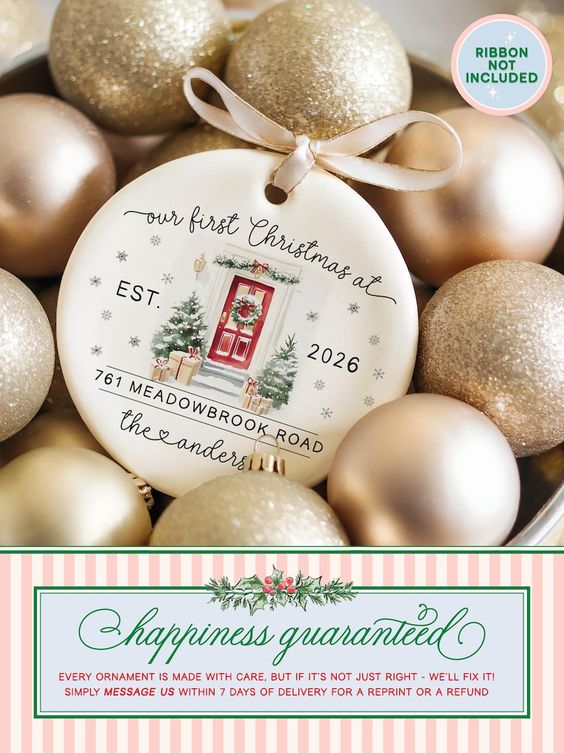 May include: A round white ceramic Christmas ornament featuring a watercolor illustration of a red front door with a wreath, two small Christmas trees, and gift boxes. Text reads: our first Christmas at EST. 2026 761 MEADOWBROOK ROAD the anders.