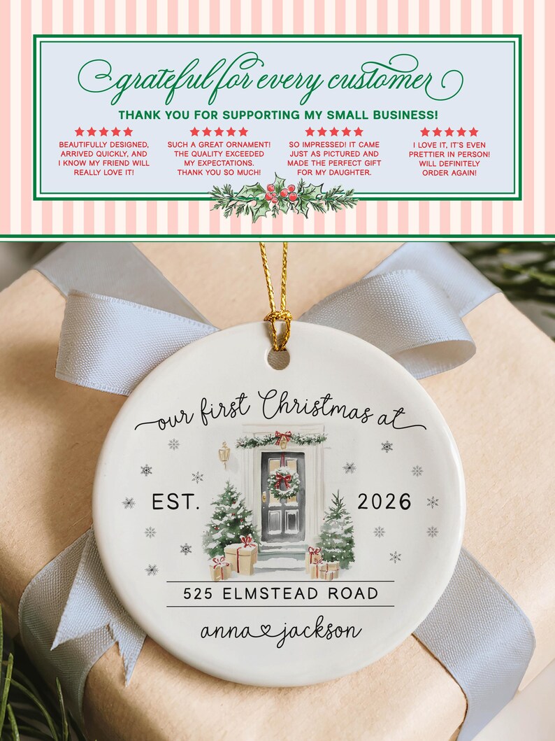 May include: A round white ceramic ornament featuring a watercolor illustration of a front door with a wreath, two Christmas trees, and wrapped gifts. The text reads: our first Christmas at, EST. 2026, 525 ELMSTEAD ROAD, and anna and jackson.