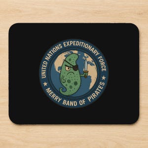 May include: A rectangular black mouse pad featuring a circular emblem with a blue border. The emblem displays a green, single-celled organism wearing an eye patch and holding a sword, set against a world map. Text reads UNITED NATIONS EXPEDITIONARY FORCE MERRY BAND OF PIRATES.
