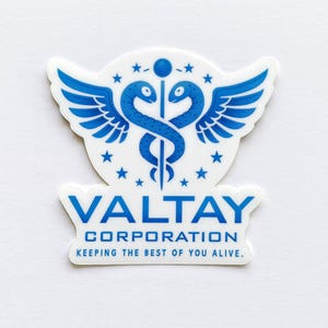 May include: A white sticker with a blue emblem featuring two snakes intertwined around a staff, wings, and stars. The text "VALTAY CORPORATION" and "KEEPING THE BEST OF YOU ALIVE" are printed in blue.