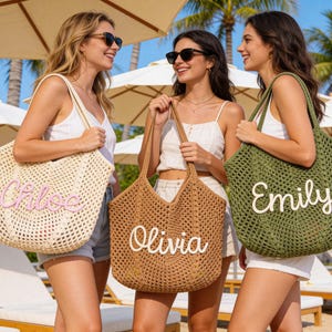 May include: Three women holding large, open-weave tote bags. One bag is beige with "Chloe" in pink, another is brown with "Olivia" in white, and the third is olive green with "Emily" in white. The bags have long handles.