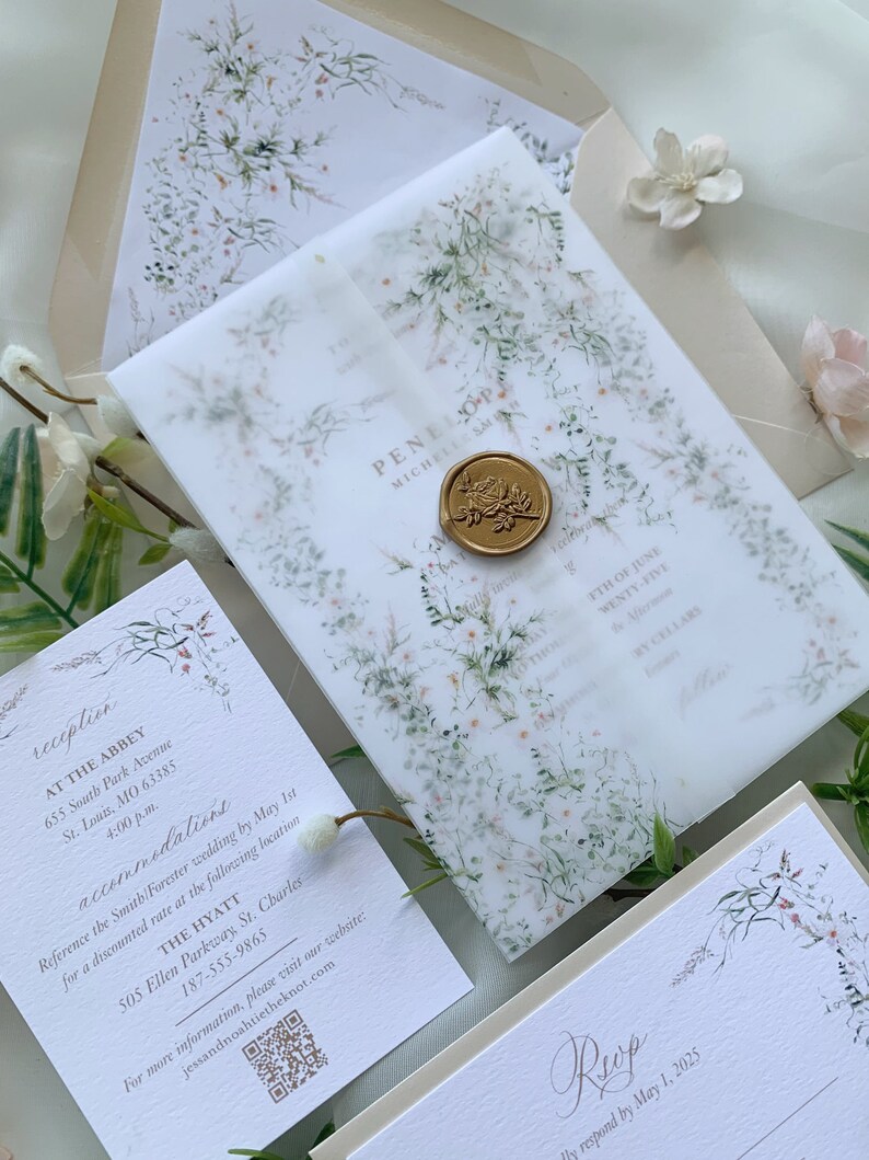 May include: Wedding invitation suite with a watercolor floral design. The invitation is on a white background with a translucent overlay with a floral pattern. The invitation includes the names Penelope and Michele Smith, the date June 5th, and the location The Abbey. The RSVP card is on a white background with a floral design and the text "RSVP" and "Kindly respond by May 1, 2025".