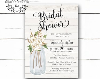 May include: A white woodgrain background with a white mason jar filled with white flowers and green leaves. The text "Bridal Shower" is written in black cursive script. The text "Kennedy Allen" is written in black text. The text "June 29, 2018" is written in black text. The text "1:00 in the afternoon" is written in black text. The text "The Allen Residence" is written in black text. The text "4587 Maple Avenue, Wentzville" is written in black text. The text "Hosted by Kate Allen & Rene Myers" is written in black text. The text "RSVP to Kate at 555-8981" is written in black text. The text "Kennedy is registered at Bed Bath & Beyond and Target" is written in black text.