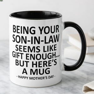 May include: A set of three ceramic mugs with a speckled, matte finish. The mugs are in shades of cream, light gray, and dark gray. Each mug has a simple, minimalist design, perfect for coffee or tea.