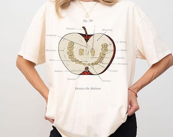 Camiseta unisex de algodón con diseño de dientes de manzana y anatomía de Magnus Archives