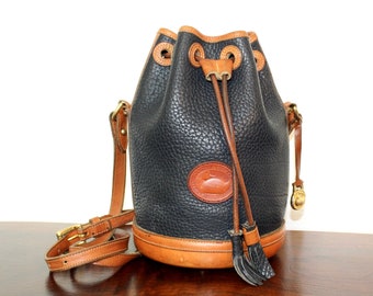 Vintage Dooney & Bourke Mini Drawstring Bag, Navy and British Tan Pebbled All Weather Leather, Shoulder Bucket Bag Purse 1980s 050110