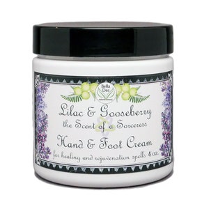 May include: White jar with a black lid, labeled "Lilac & Gooseberry the Scent of a Sorceress Hand & Foot Cream for healing and rejuvenation spells 4 oz."