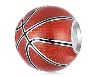 Peut inclure: Un charm de basket-ball avec un design orange et noir détaillé. Le charm est rond avec une surface texturée et présente des lignes noires et des accents argentés. Le charm est conçu pour être ajouté à un bracelet ou un collier.