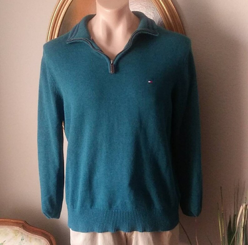 Tommy Hilfiger mens 1/4 Zip Sweater. Large image 1