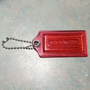 COACH Pink Resin Signature Coach Purse Hang Tag  Silver Toned Ball Chain.