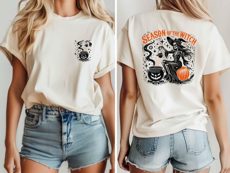 以下が含まれることがあります： ハロウィーンをテーマにしたグラフィックのクリーム色のTシャツ。前面には、不気味な顔と蒸気のある大釜が描かれています。背面には、カボチャを持ったスケルトンの魔女と、オレンジ色のテキスト「SEASON OF THE WITCH」が表示されています。