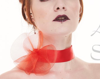 Red fantasy ruffle neck asymmetric collar with delicate soft horsehair style back closure on elastic neck band