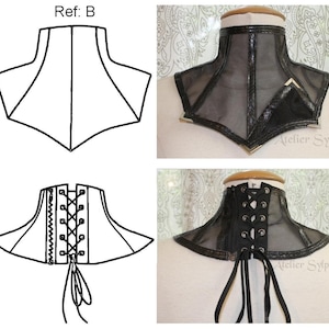 May include: A black mesh and leather choker with a lace-up back. The choker has a geometric design and is accented with silver hardware. The text "Atelier Sylphe" is visible on the choker.