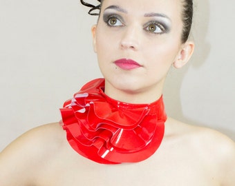 Red fantasy ruffle neck asymmetric collar with delicate shiny PVC fabric style back closure