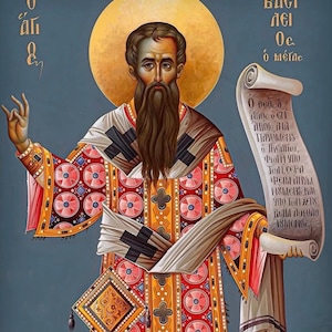 May include: An icon depicting a man with a long brown beard, wearing a detailed robe with red and gold patterns. He holds a scroll with text and is set against a blue background with a golden halo. The image has Greek text.