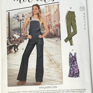 May include: McCall's sewing pattern M8162. The pattern features a woman wearing denim overalls. Also shown are illustrations of olive green trousers and floral print shorts overalls. The text reads "Designed and printed in USA."