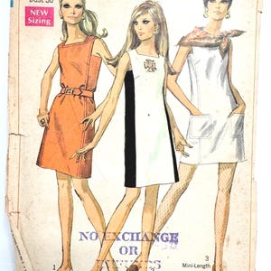 May include: Vintage Simplicity sewing pattern featuring three mini-length dress designs. The cover art shows illustrations of the dresses in orange, white with a black stripe, and white with pockets. The pattern is for Miss size 14, bust 36.