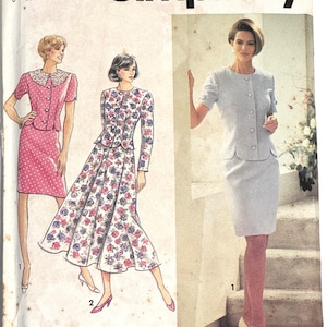 May include: Simplicity sewing pattern 7670 featuring illustrations of women's suits and dresses. The designs include a pink polka dot suit, a floral print dress, and a light blue skirt suit. The pattern includes size information.