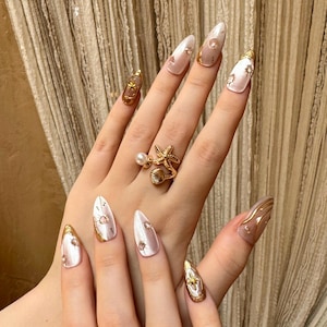 Pink Cat Eye Nails | Gold Star Nails | Crystal Press On Nails | Almond Fake Nails | Glossy Reusable Nails | French Tip Nails