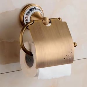 Suporte de papel higiênico de bronze