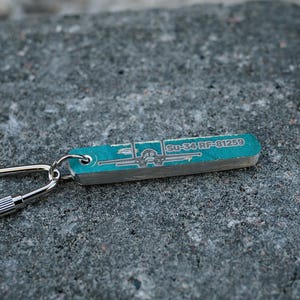 SU-34 Aviation Relic Keychain – Russian Jet Debris from Kyiv 2022 Conflict