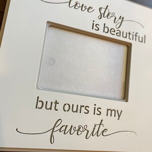 Frame with qoute Every Love Story is beautiful, but ours is my Favorite. frame measures 11.75 X 11.75 and holds a 5X7 photo. image 3