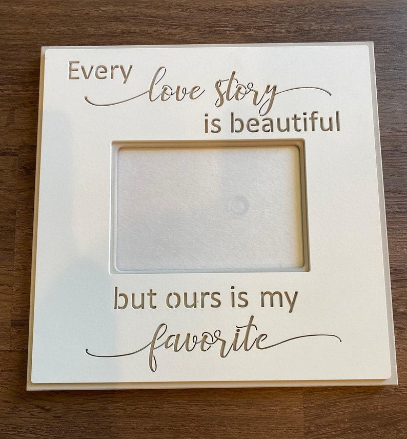 Frame with qoute Every Love Story is beautiful, but ours is my Favorite. frame measures 11.75 X 11.75 and holds a 5X7 photo. image 2