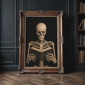 May include: A framed wall art piece featuring a human skeleton reading an open book against a solid black background. The skeleton is beige and detailed, held within an ornate, dark brown wooden frame with intricate carved floral motifs.