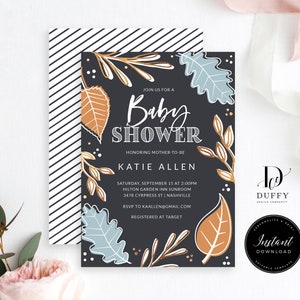 May include: A black and white striped background with a dark gray invitation card featuring gold and blue leaf illustrations. The text on the card reads "Join us for a Baby Shower Honoring Mother-to-be Katie Allen Saturday, September 15 at 2:00pm Hilton Garden Inn Sunroom 3478 Cypress St | Nashville RSVP to kaallen@gmail.com Registered at Target"