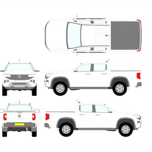 May include: White pickup truck illustration, shown from multiple angles: top-down, front, side, and rear views. The truck has a gray bed and black wheels. The front view shows the VW logo. The rear view shows the word "AMAROK".