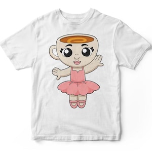 May include: White t-shirt featuring a cartoon illustration of a coffee cup character dressed as a ballerina. The character has a light brown cup with coffee inside, large eyes, a pink tutu, and ballet slippers. The design is centered on the shirt.