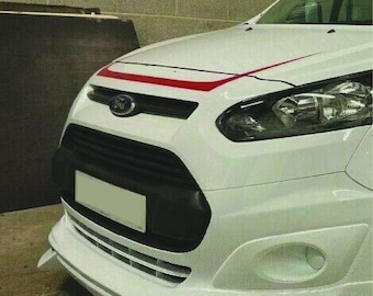 May include: White Ford Transit Connect van with a black grille and bumper. The hood features a red stripe. The front of the van has a sporty, custom appearance with a modified front spoiler and fog light surrounds.