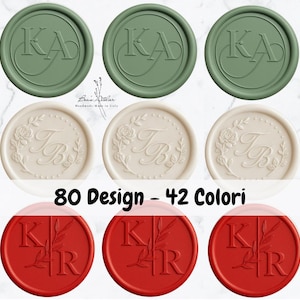 May include: A collection of wax seals in green, cream, and red. Each seal features embossed designs with initials and floral or botanical elements. The text "80 Design - 42 Colori" is displayed below the seals.