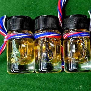 Extremely Power Attract Wealth Money Oil with gold color Leaf  (No.1 in Thailand for made Mystic Oil Master)