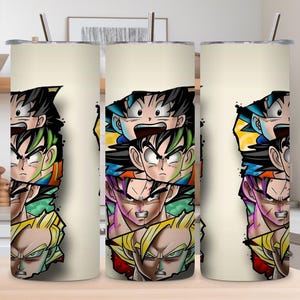 May include: Three white insulated tumblers featuring a stacked anime character design. The design includes characters with black, green, blue, purple, and yellow hair. Each tumbler has a silver straw. The tumblers are cylindrical.