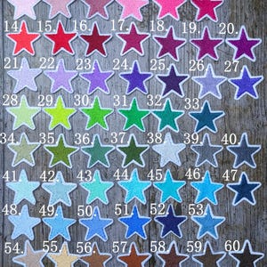 a number of stars on a wooden surface